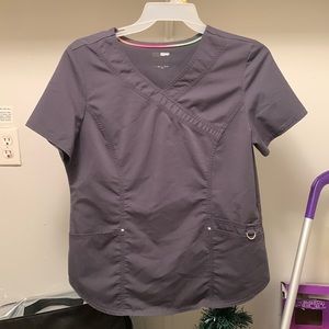 Grey scrub shirt.